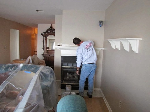 09_worker_fireplace_repair.jpg