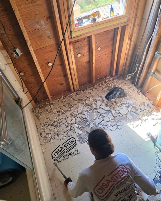 15_worker_floor_demolition.jpg