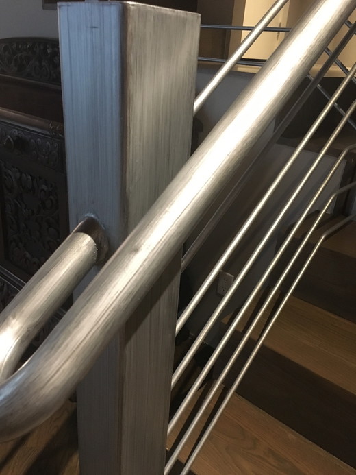 Detail of refinished, metal stair rails, striaed platinum, modern, contemporary, Cherry Creek, Denver copy.jpg
