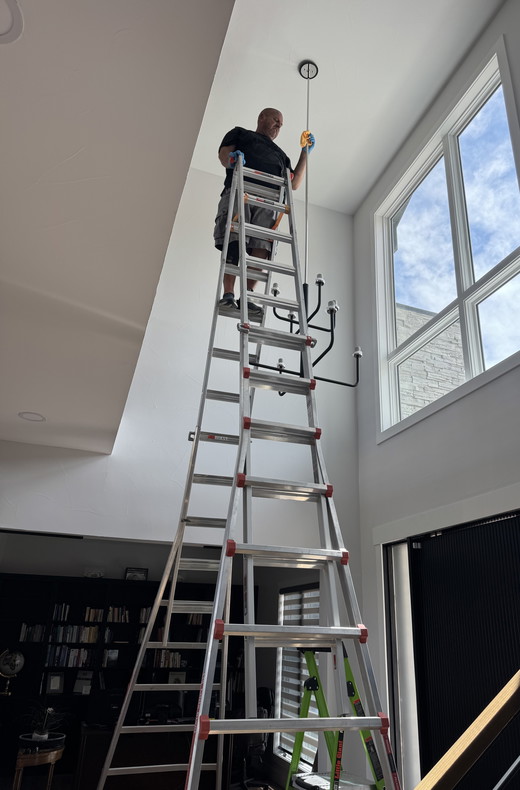 Kevin 21' Ladder Front Entry Chandelier.jpg