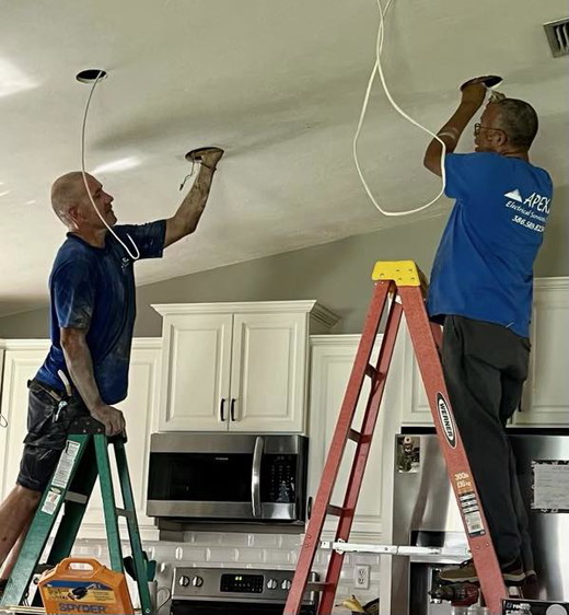 TJ AND DINO DOING LIGHTING.jpg