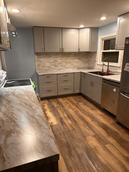 This-remodeled-kitchen-features-soft-gray-shaker-style.jpeg