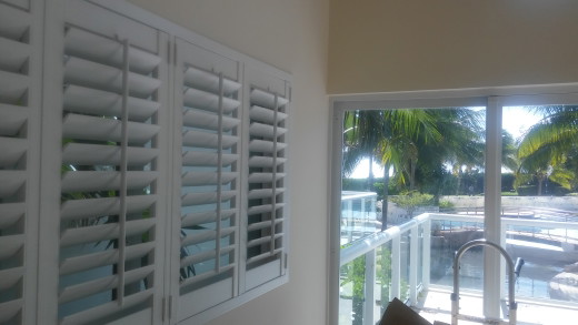 White Shutters Front Tilt Bar.jpg