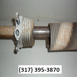 broken springs-Garage Door Repair Greenfield, (317) 395-3870.png