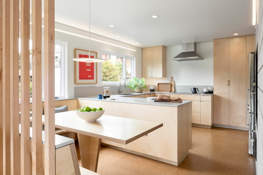 diamond-heights-eichler-san-francisco-mid-century-modern-sustainable-remodel-kitchen-counter-quartz-solid-surface-cork-flooring-wood-slat-screen-banquette-breakfast-bar-birch-appleply-2.jpg