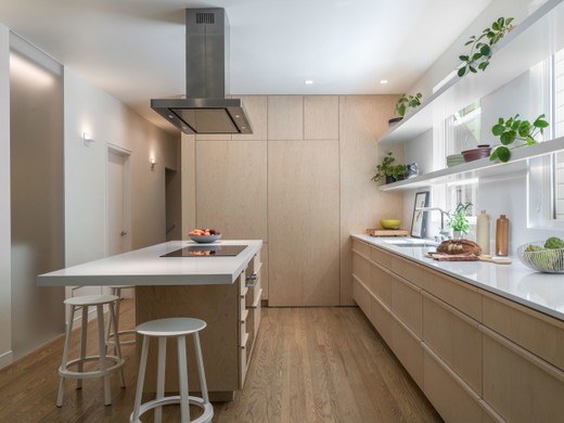 liberty-street-san-francisco-modern-minimalist-remodel-kitchen-island-cantilever-white-quartz-counter-whitewashed-maple-cabinets-white-floating-shelving-over-window-hidden-pantry-6.jpg