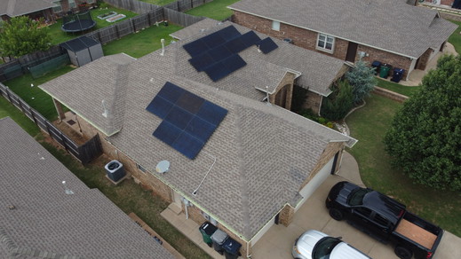 summer-brick-home-closeup-panels-jun2025.jpg